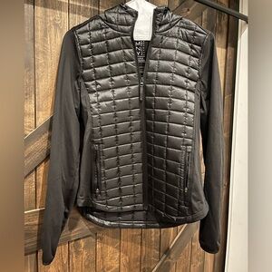 Sporty mixed media sweatshirt/top with excellent fit and comfort. L.